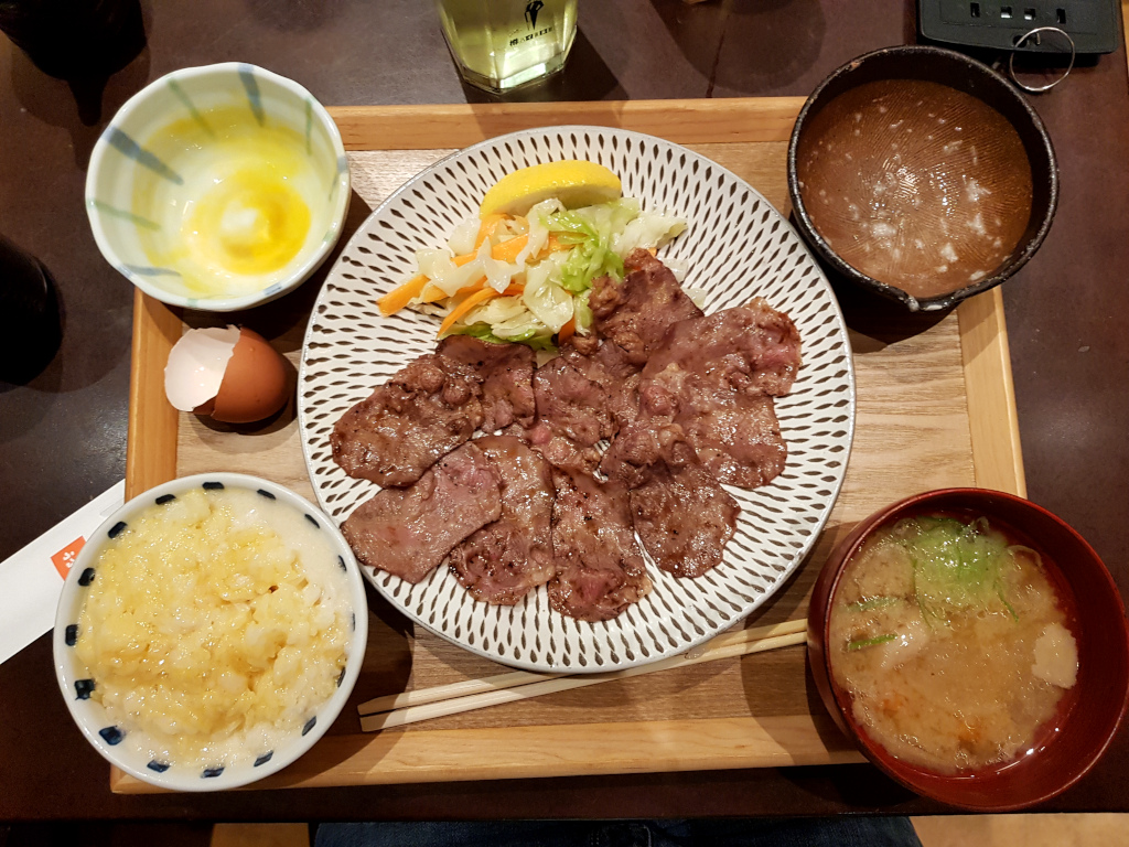 Raw egg and beef tongue in Nagasaki, Japan